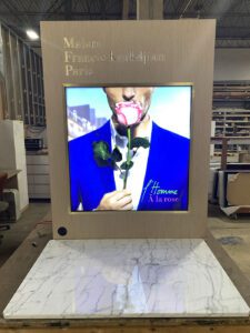 A media display with a digital image on it.