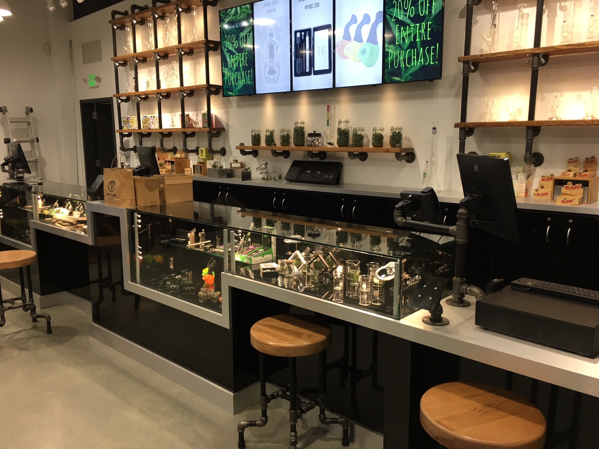 Green Labs’ custom store display fixtures effectively features their products.